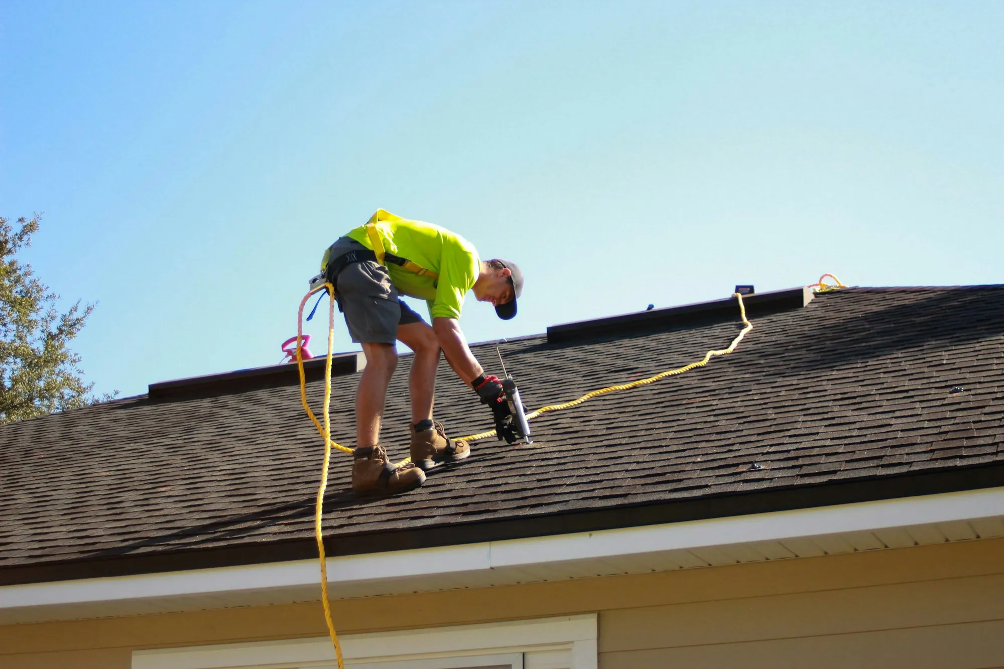 Asphalt shingles on a house roof in daylight